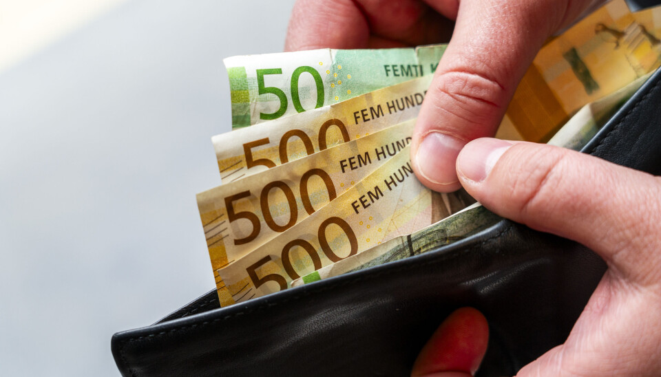 Oslo 20231020. Illustrasjoner av lommebok med penger, 50 kr og 500 kr sedler.Foto: Gorm Kallestad / NTB